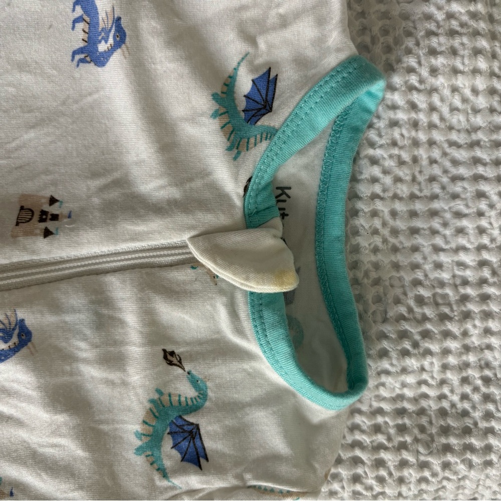 Like new Kyte baby dragon zipper romper 6-12 months.